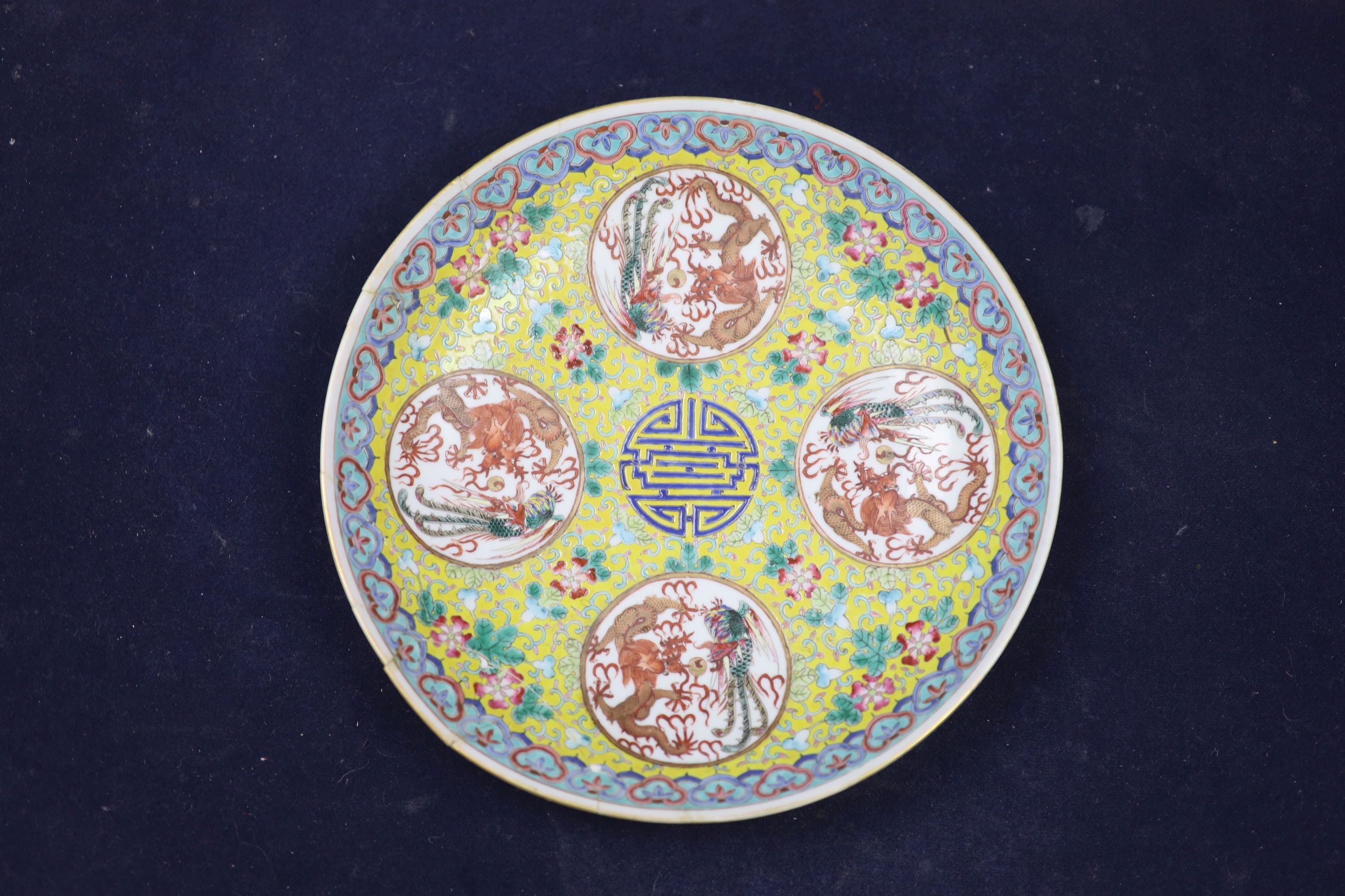 Two Chinese blue and white vases and a dish, together with a famille rose dish, tallest 28cm